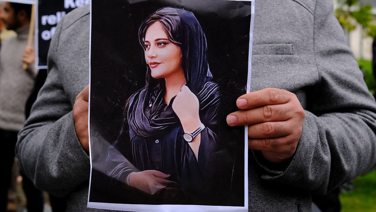 Protestors take part in demonstration in front of the Iranian embassy in Brussels, Belgium following the death of Mahsa Jina Amini (pictured above). (Shutterstock)